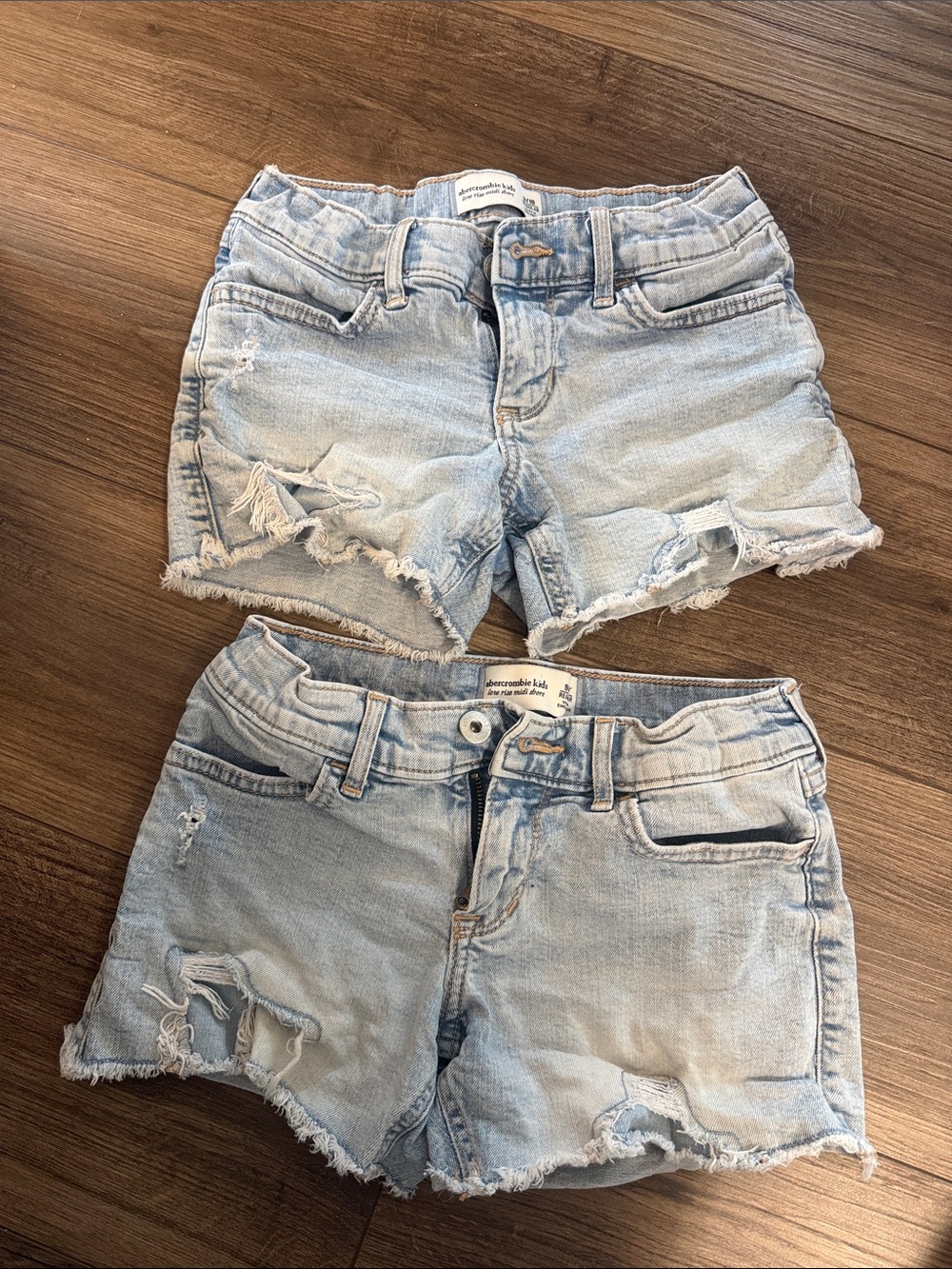abercrombie kids light blue distressed denim shorts (pair)